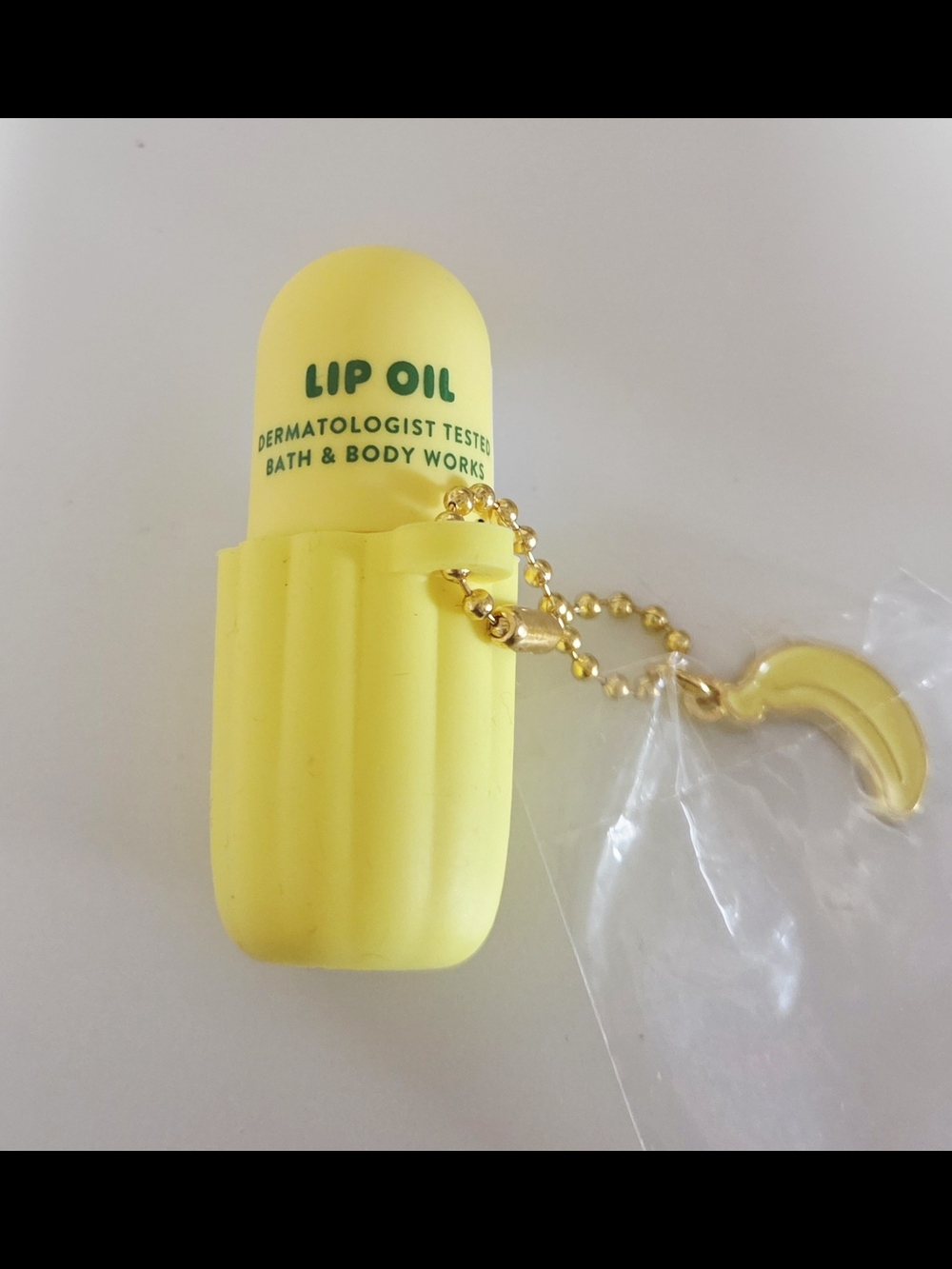 Bath & Body Works Yellow Lip Oil Keychain with Banana Pendant